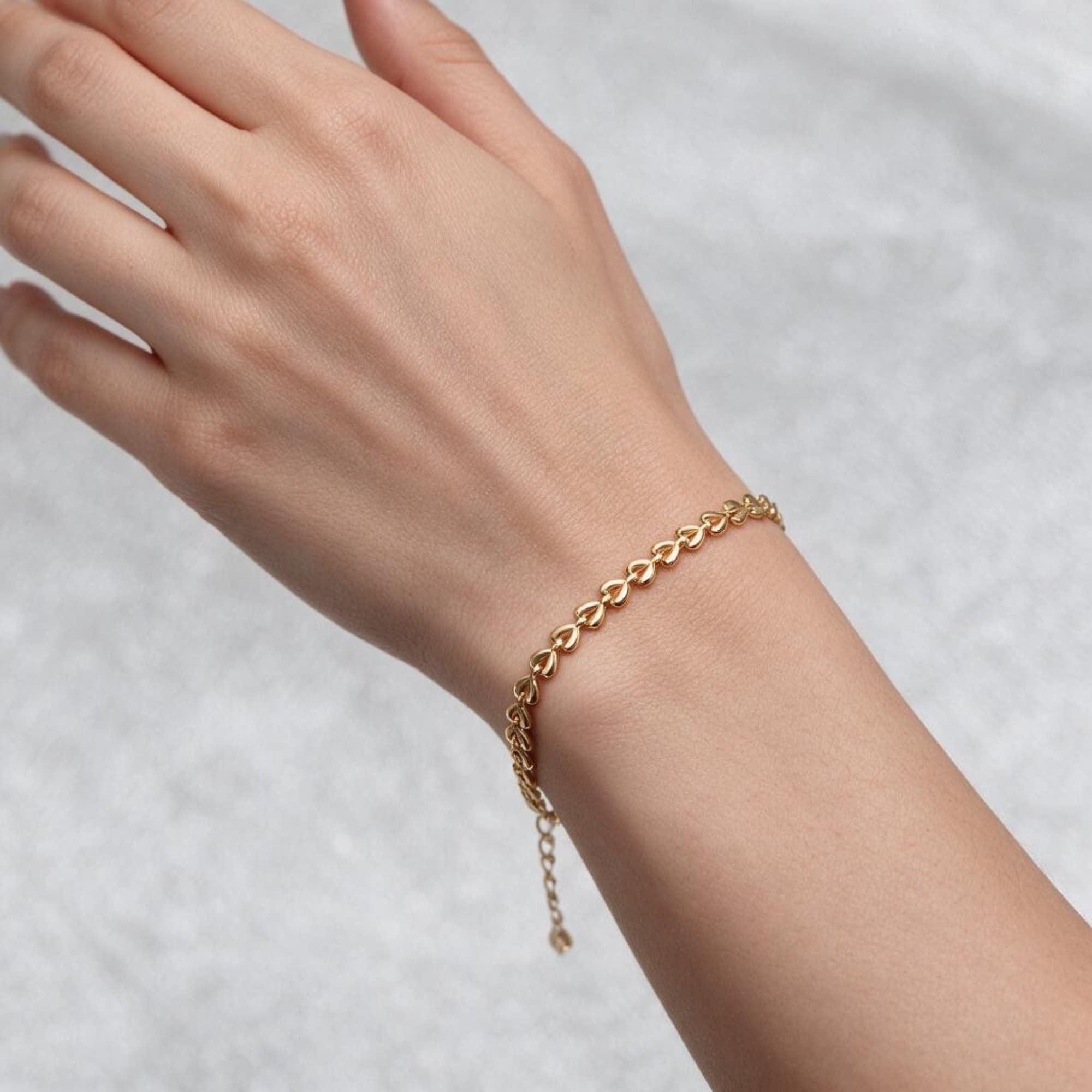 Pulseira Corações Duplos Dourado